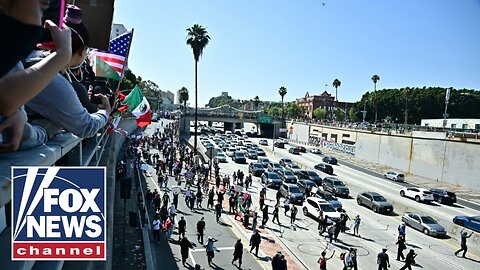 FREEWAY TAKEOVER_ Los Angeles rioters take to major highway