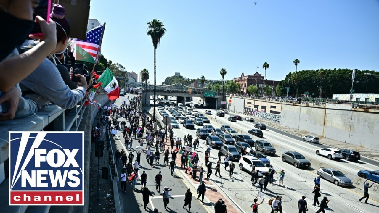 FREEWAY TAKEOVER_ Los Angeles rioters take to major highway