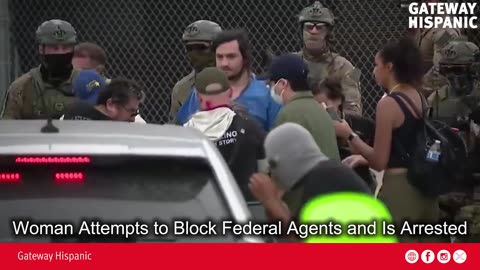 Woman Attempts to Block Federal Agents and Is Arrested