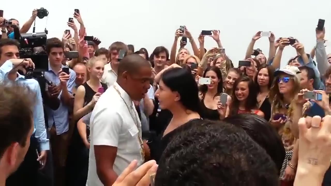Marina Abramovic & Jay Z performing a twisted ritual