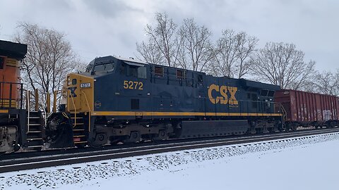 Dash 9 Coupled with a CSX pulling tankers