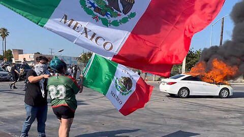 Mexican flags, cars burning, chaos in streets #losangeles #california #RIOTS #LA #Military