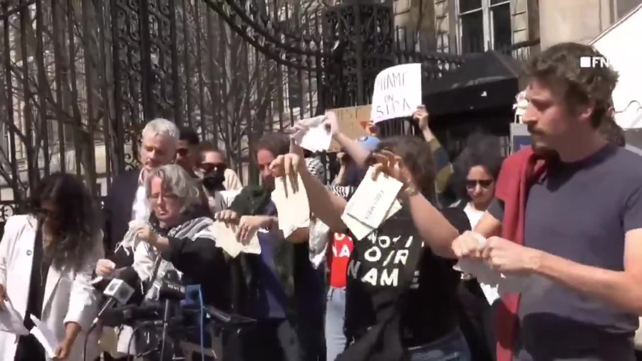 Pro-Palestine Columbia graduates rip up their diplomas to protest the Trump admin