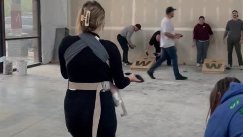 Multitasking Mom Nails Cornhole While Feeding Her Newborn