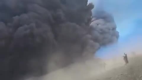 Tourists and guides run for their lives when Mount Etna suddenly erupts