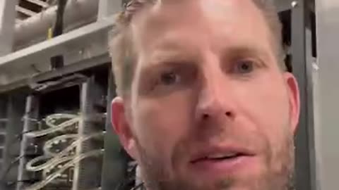 Eric Trump shows off 'America Bitcoin' mining facility.