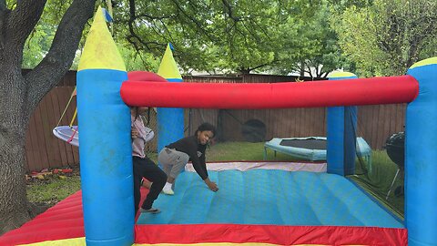 Backyard bounce house fun kids