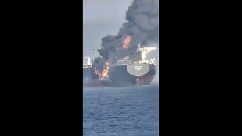 oil tanker is burning in the Strait of Hormuz