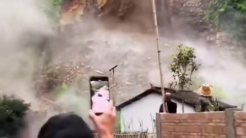 A video from China shows a massive landslide, appearing as if an entire mountain is crumbling