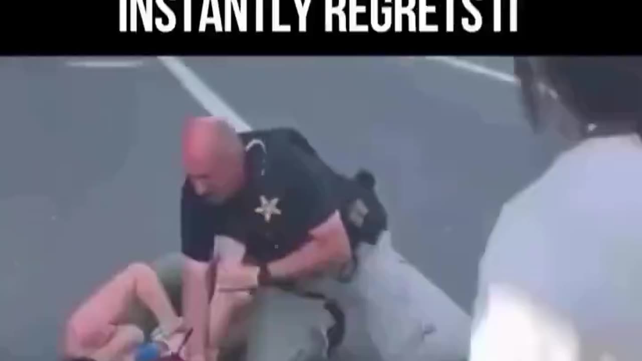 Protesting woman gets slapped by cop 🤪