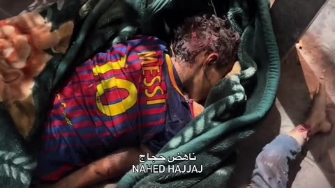 Among the martyrs is a child wearing the shirt of his favorite hero