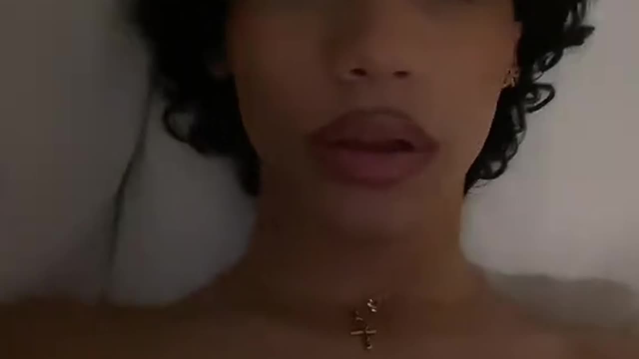 femboy in home seeing the camera