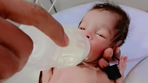 Newborn babies milk feed