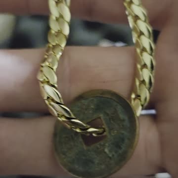 Removing 708-958 AD Japan cash coin for case