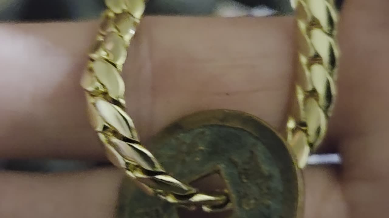 Removing 708-958 AD Japan cash coin for case
