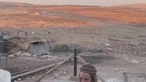 Teenage 1sraeli settlers backed by the IOF storm the land of Pale$tinian Bedouins
