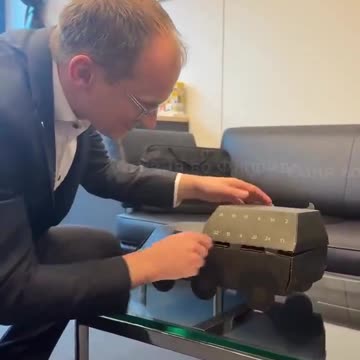 German MP Shows Military Calendar as Germany Builds Up Defense