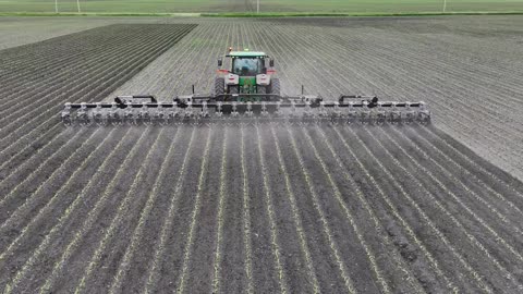 Green Tractor Tills Field: Witness the Powerful Swinging Spider! #farming #cultivators #agriculture