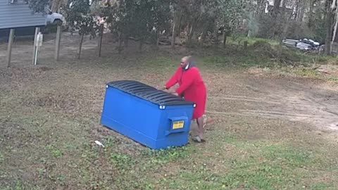 Man picks up Coyote by the tail !!