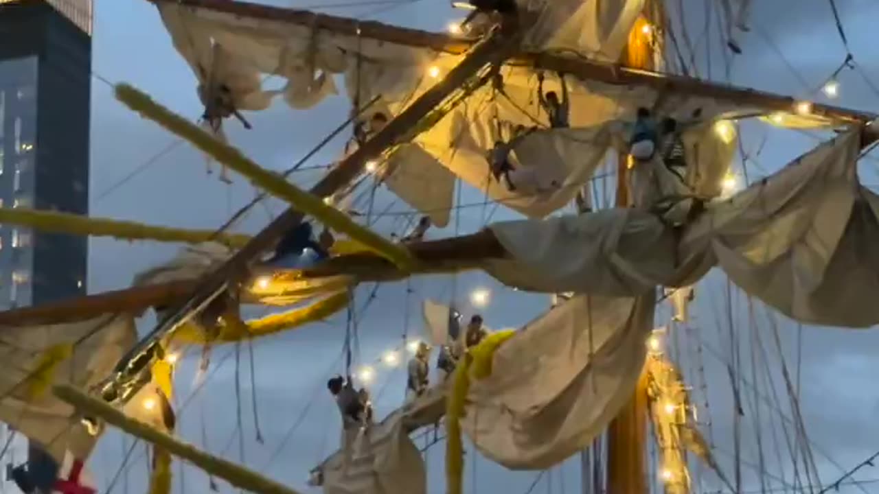 Sailors were seen dangling from the topmasts after ship collided with Brooklyn Bridge