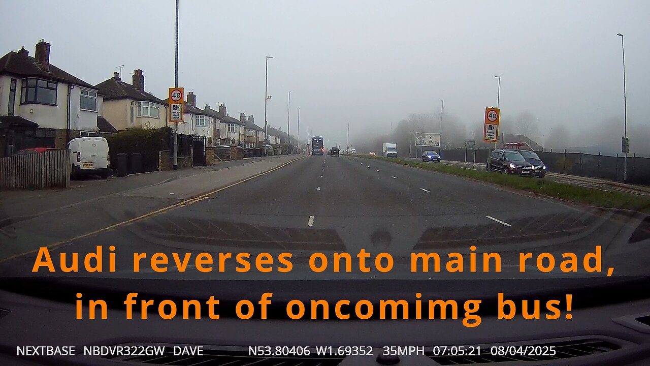 Audi reversing into on coming traffic!