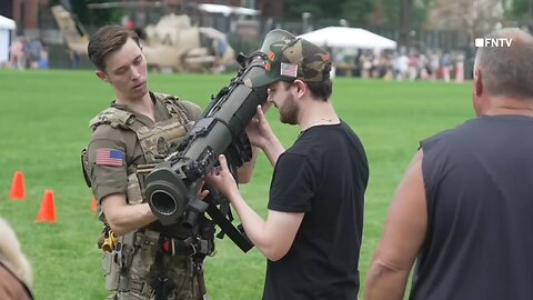 DC Military Parade Attendees Pose with Weapons and Tanks