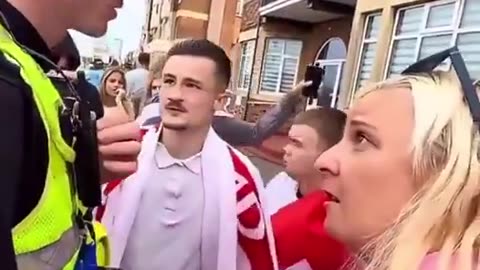 British Police arrest an 11 year old boy for raising a British Flag at a protest