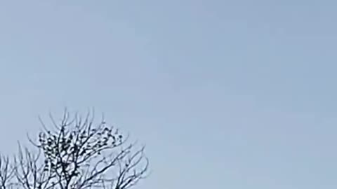 Bonner Springs, Kansas man films a floating black ring in the sky during a motorcycle ride.