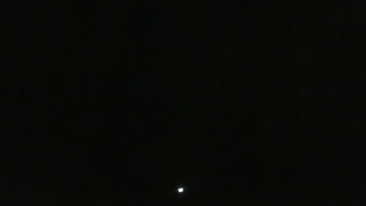 The waning moon appears in the night sky, its light illuminates the earth [Nature & Animals]