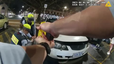 Australia Police taser forcefully arrest man allegedly seen with alcohol in Civic