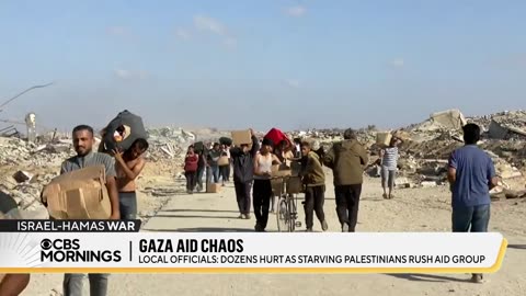 Palestinians rush to new aid centers in Gaza as chaos erupts