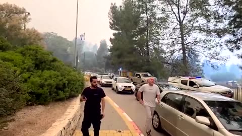 Residents scramble to evacuate as wildfires burn in central Israel