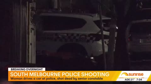 Woman shot dead after driving her car at Melbourne police - 7NEWS Australia