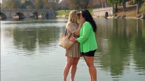 🌅 Timeless Love Two Mature Women Share a Passionate Kiss by the Lake
