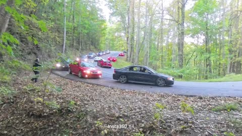 Sports Car Drifts Over Line, Hits Moving Truck