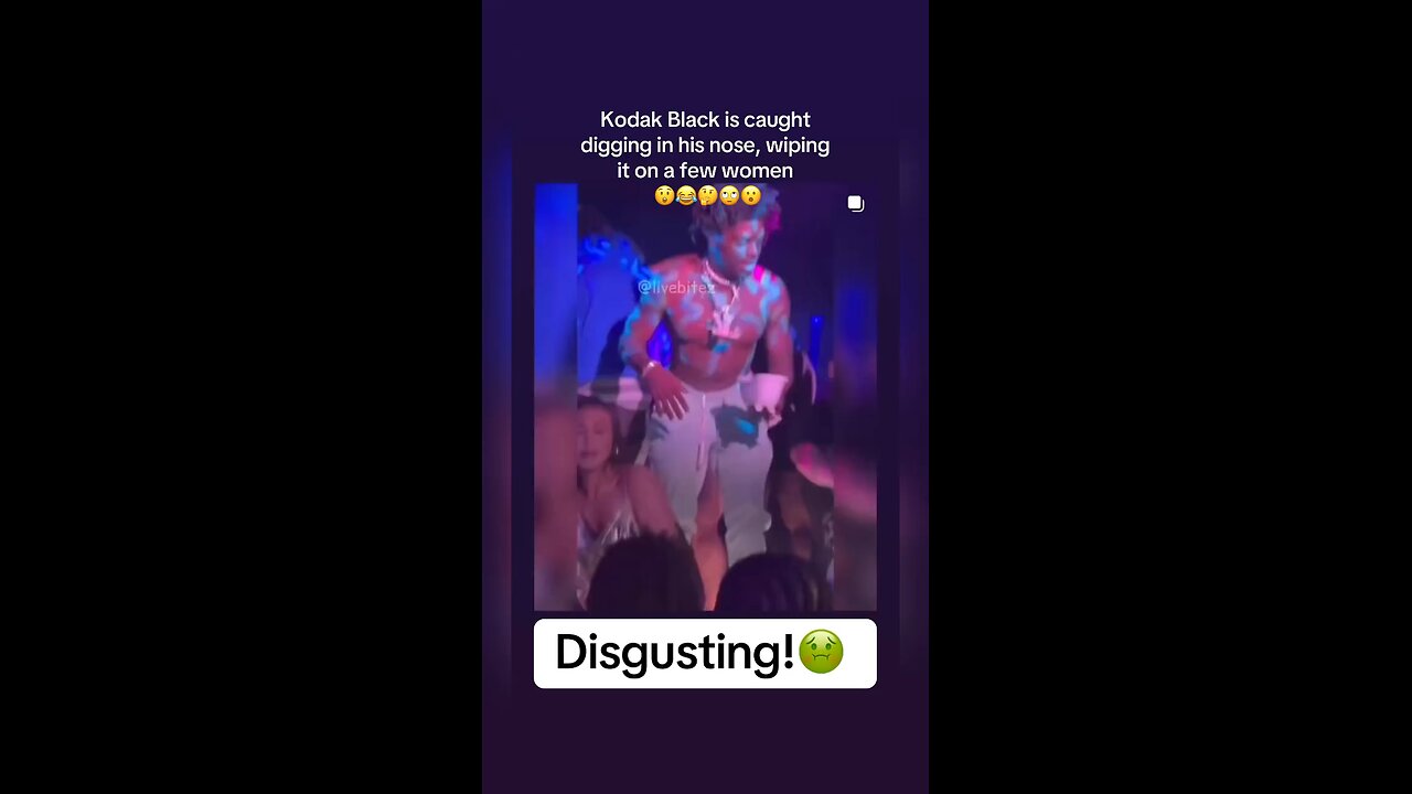 The rapper kodak black is caught , digging up his nose,wiping it on people head!