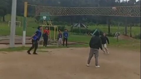 Hilarious volleyball fail moment as lad hits the ground in comical fashion while trying to hit ball