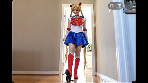 A giant Sailor Moon cosplayer with red boot step on the tiny man