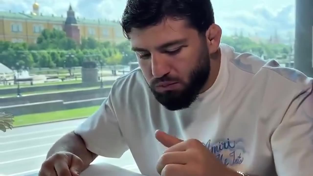 UFC star Arman Tsarukyan eats Black Beluga caviar in Red Square Moscow. Each bite is like 300 bucks.