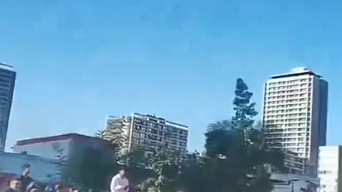 Venezuelan exiles erupting in tears of joy, chanting 'Libertad!'