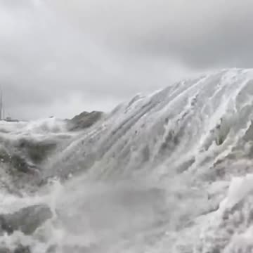 North Carolina pummeled by strong waves that breached a sand dune due to Hurricane Erin