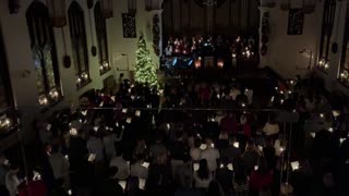 December 24, 2025 - A Congregation Joins in a Candlelight ‘Silent Night’