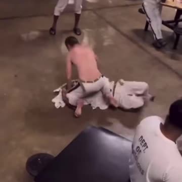 Inmates cheer as man turns the table from a sucker punch, Instant Karma