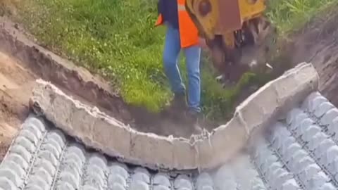 A flexible concrete mat designed to protect riverbanks and hillsides from erosion