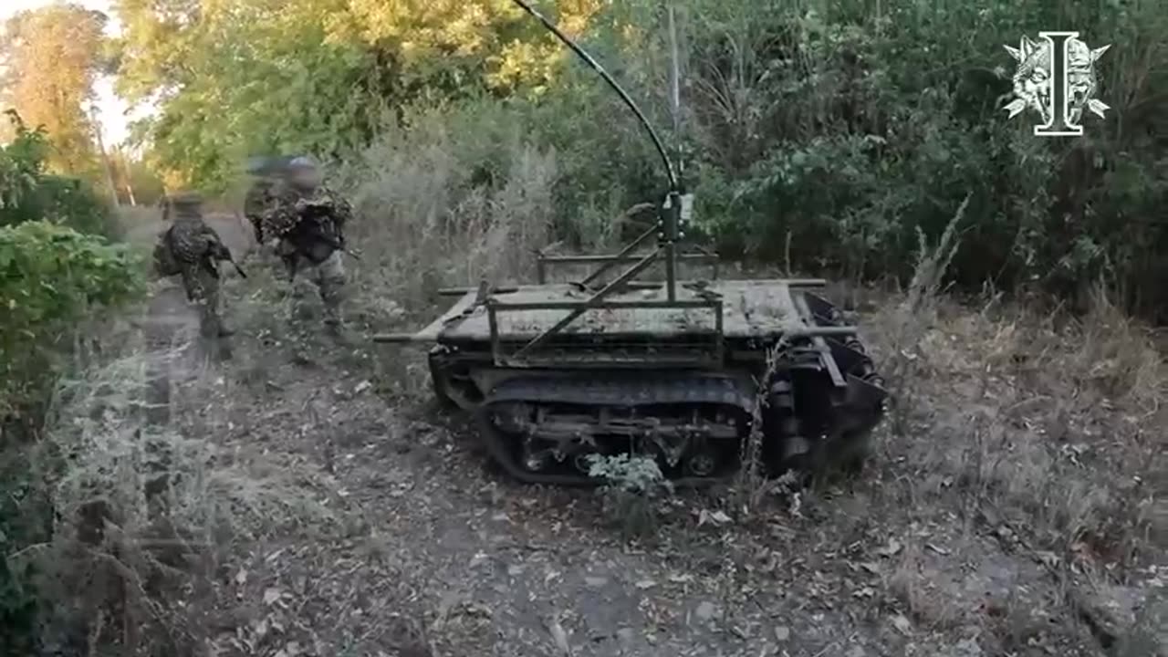 Ukrainian Soldiers Advance Behind Demining Robot