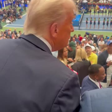 President Trump signs hats at US Open