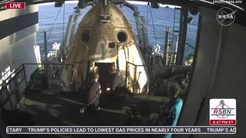 First NASA Astronaut exits SpaceX Dragon Capsule and breathe fresh air after months stranded