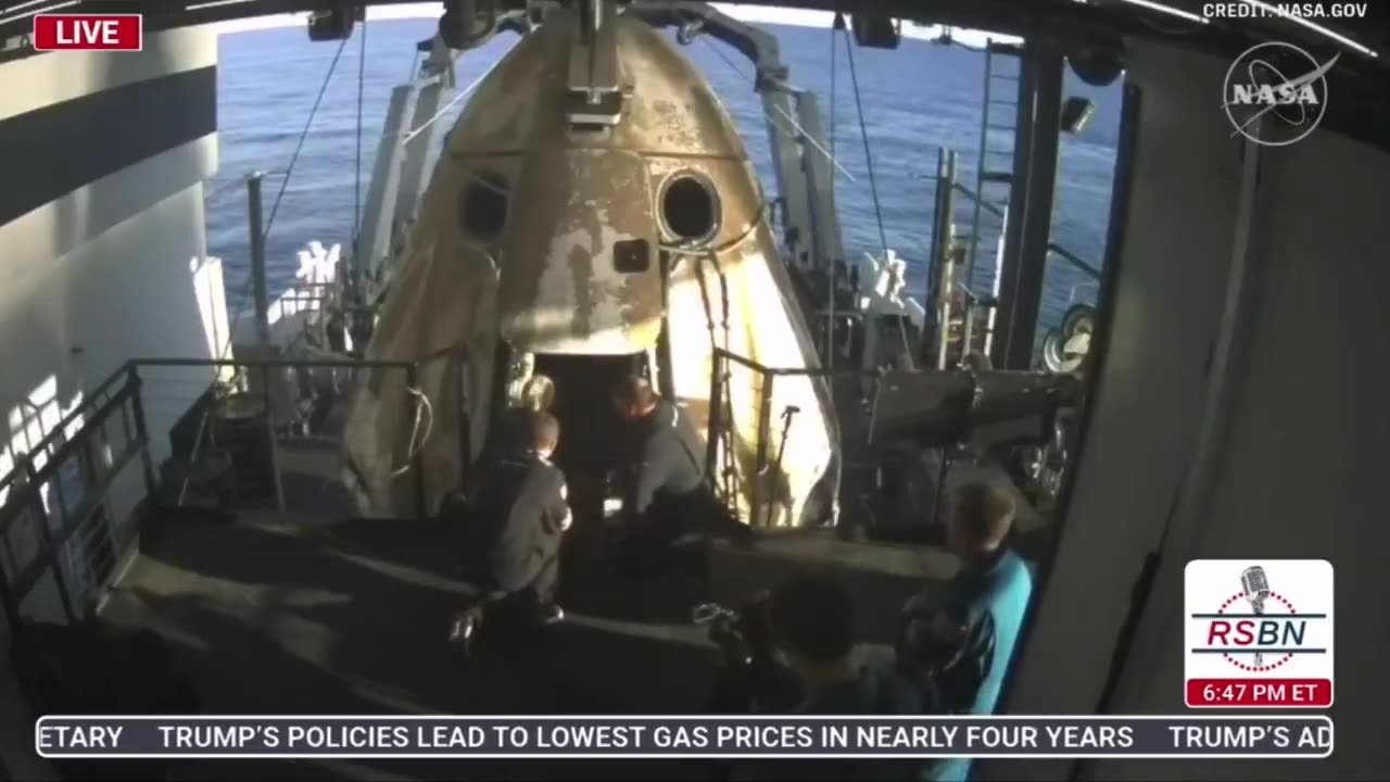 First NASA Astronaut exits SpaceX Dragon Capsule and breathe fresh air after months stranded