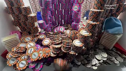 World’s largest poker chip wall falls over high limit coin pusher