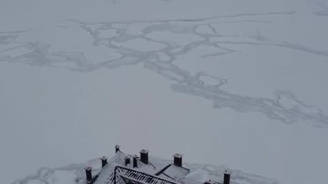Buried in snow and silence, the mansion waits